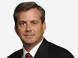 Former Triad exec charged, settles with SEC