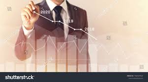 Growth Success In 2020 Concept Businessman In Suit Plan With Pen And Increase Of Positive Indicators In His Bu In 2020 Finance Plan Finance Financial Business Finance