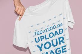 Placeit Mockup Of Someone Holding A T Shirt In Front Of A Colored Background Mockup Design Mockup Shirts
