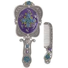 Gorgeous antique 1930's victorian hand vanity mirror, vintage art nouveau brass hand mirror the frame is surrounded by intricate brass work with hand painted gold flowers on a blue background. Nerien Vintage Rose Metal Mirror Comb Set Antique Hand Held Vanity Mirror Comb Set Antique Pewter