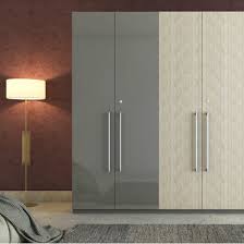 2 door wooden wardrobe online: A Dual Tone Swing Door Wardrobe For Segregating Your Essentials Wardrobe Laminate Design Wardrobe Door Designs Wardrobe Design Modern