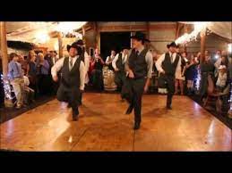 The 8 Seconds Line Dance Is As Iconic As It Was In 1994 Country Line Dancing Western Groomsmen Line Dance Songs