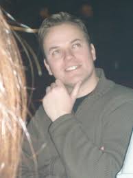 Brett deep in thought... Kim's hair in the way