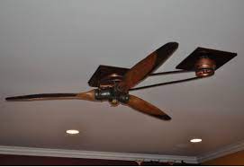 Most ceiling fans have an electrical switch that allows one to reverse the direction of rotation of the blades. Antique Plane Propeller Ceiling Fan On Pulley System Belt Driven Ceiling Fans Propeller Ceiling Fan Antique Ceiling Fans