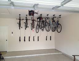 Bike lift hoists are perfect for cyclists who live in smaller spaces. Stylish Bike Storage Ideas For Your Home Or Garage Bike Storage Bicycle Storage Bike Storage Garage Ceiling
