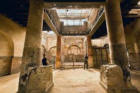 A Hermit Praying In The Ruins Of A Roman Temple Photo Hall Of The Augustals At The Herculaneum Ruins Herculaneum Pompeii And Herculaneum Travel Photography