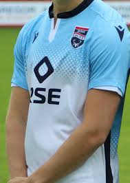 The shirts melange effect front features an embossed silicone crest and macron hero for added match day comfort making the shirt extremely lightweight, malleable, and durable. New Ross County Kit 2020 21 Macron Unveil Rcfc Home Away Shirts With New Sponsor Rse Football Kit News