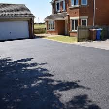 Epoxy can be used to fill in cracks in the concrete driveway that are not from. Resincoat Pro Tarmac Sealer Driveway Paint Resincoat
