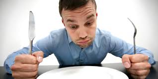 What is the difference between fasting and dieting