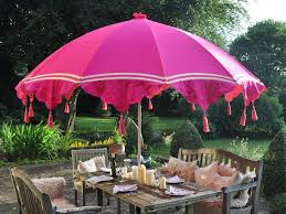 The best garden or outdoors parasols are made from sturdy materials that offer a good protection and a wide shade. Bold Vibrant Garden Parasols From The East London Parasol Company Fresh Design Blog Garden Parasols Small Garden Parasol Patio Garden Design