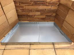 A fireplace can be a cozy addition to your home, but it can often leave soot (that black dust caused by burning wood logs) on the surrounding bricks. Hi Flame Tray Ash Pan Clean Up Expandable For Up To 30 Basket Fireplace Grate Sliver Color Fireplaces Stoves Accessories Amazon Com Au
