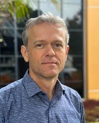 What's the reason for the polluted beach area sign?