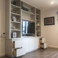 A Square Edged Contemporary Styled Tv Media Unit Shelving Cupboards And Drawer Storage Living Room Built Ins Elegant Living Room Living Room Shelves