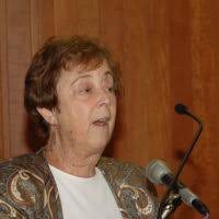 Roy Billings, right, speaks with friends prior to his