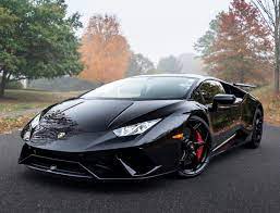 Lamborghini Huracan Performante Painted In Nero Noctis W Tricolore Stripes Along The Doors Photo Take Lamborghini Huracan Sports Cars Lamborghini Lamborghini