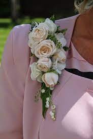 Lace dresses and floral dresses for the mother of the bride for a casual country wedding, are also great fit for this setting. Wedding Corsages For Mothers Fall Into Flowers