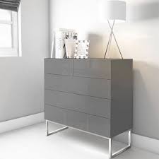 Is this chest of drawers already assembled together before it is shipped out? Strada Grey Gloss Chest Of Drawers With Glass Top And 5 Drawers Furniture In Fashion Chest Of Drawers Grey Chest Of Drawers Modern Chest Of Drawers