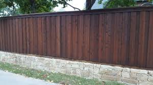 It looks like the existing stained fence could use a fresh coat too. Fence Staining Texas Best Stain