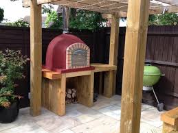 Everyone loves pizza and brick oven pizza is about as good as it gets. Pizza Oven Stand Made Out Of Sleepers With Wood Store And Work Etsy
