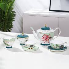 Cup and saucer molded swirl floral bouquet gold trim mid $ 5800. Oriental Sunset Mini Porcelain Tea Cup And Saucer Set Home Living Kitchen Dining Vadel Com
