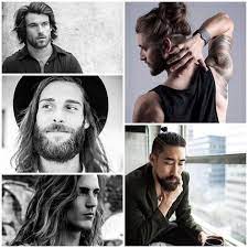 langhaarfrisuren manner man mit dutt frisur und tatowierung auf der schulter langhaarfrisuren langhaarfrisuren manner dutt frisur