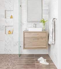 Check spelling or type a new query. Bathroom With White Carrara Marble Walls And Warm Wood Accents Marble Wall Tiles Wood Tile Bathroom Bathroom Wall Tile