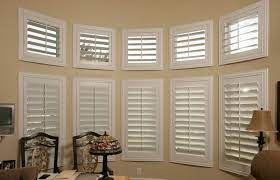 My favorite, favorite window treatment has to be the plantation shutter. The Best Bay Window Treatments For Your Home Shutters Sunburst Shutters