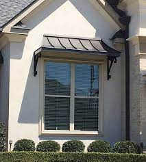 The Bronze Juliet Awning With The Lazy Scrolls House Awnings Modern Windows And Doors Outdoor Window Awnings