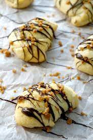 Mars Bar Stuffed Crescent Rolls Easy Dessert Recipe Using Pillsbury Crescent Rolls And Snack Sized Mars Bars Dessert Recipes Easy Desserts Desserts