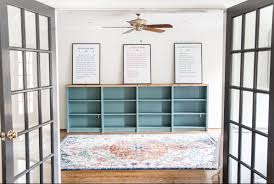 A black and white kitchen by studio surface, an interior design firm out of del mar, california gets a functional lift from a narrow, stainless steel chef's table. Brilliant Ikea Billy Bookcase Hacks The Cottage Market