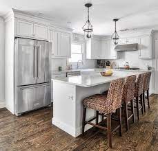 It's a smart and efficient way to increase workspace. White L Shape Kitchen With Island Kitchen Designs Layout Kitchen Remodel Small Kitchen Floor Plans