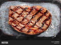 Both prime rib and rib eye are cut from the rib of a cow. Ribeye Steak Salt Image Photo Free Trial Bigstock