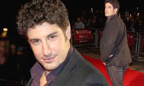 BFI London Film Festival 2012: Jason Biggs can't help but pose like a lady  as he walks the red carpet