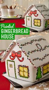 Cover Gingerbread House Panels In Thinned Royal Icing And Paint With Icing Color And Fo Gingerbread House Cookies Gingerbread House Christmas Gingerbread House