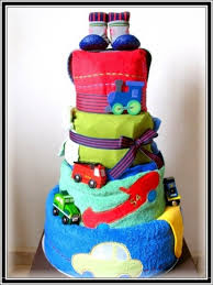 Adorable baby shower centerpiece gift. How To Make A Diaper Cake Step By Step Stone S Finds