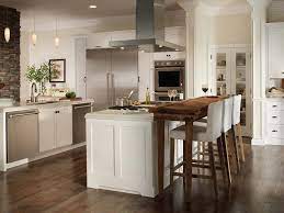 Especially those white melamine cabinets with the strip of oak on the bottom of each door. Kitchen Color Schemes Bertch Cabinet Manufacturing
