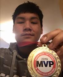 Boozhoo! Vinny Choken was picked for our Athlete student for the month of  January, 2025. Hello, my name is Vinny Choken. I am 12 years old. My  favorite sports are hockey, basketball