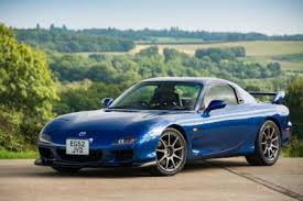 Image result for Phoenix Blue 1973 Mazda