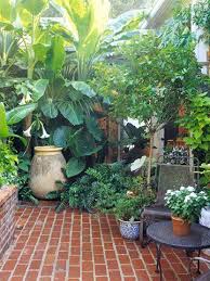 16 Simple Solutions For Small Space Landscapes Small Backyard Gardens Courtyard Gardens Design Small Courtyard Gardens