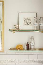 This over the toilet shelf measures 23.63 w x 70.25 h, and features three shelves to organize your toiletries, spare towels, and more. Glass And Brass Vintage Glass Shelves Above Toilet Transitional Bathroom Glass Bathroom Shelves Floating Glass Shelves Glass Shelves
