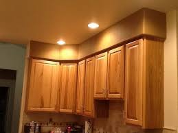 Avoid awkward scallops of light by aligning the downlights with cabinet doors, as seen in this kitchen designed by mosaic architects boulder. Need Help With Ugly Soffit Above Kitchen Cabinets