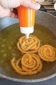 How To Make Homemade Jalebi Recipe With Pictures Jalebi Recipe Without Yeast Crispy And Crunchy J Funnel Cake Recipe Homemade Funnel Cake Cake Recipe No Milk