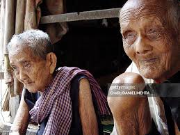 Sek Yim , 120-year-old, and his wife Ouk, 108-year-old and blind, sit...  News Photo