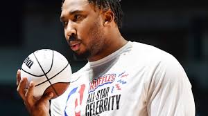 In full uniform, Myles Garrett warms up with Cavs Summer League team