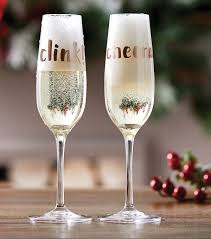 Champagne has put on its party clothes for the holiday season! Glass How To Make Holiday Champagne Flute Champagne Flute Champagne Happy Mom Day
