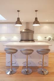 Kitchen breakfast bar lighting design information about home. Contemporary Sleek White Kitchen Breakfast Bar Island Feature Pendant Lights Brighton Architect Breakfast Bar Kitchen Breakfast Bar Lighting Bar Lighting