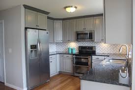Gray Cabinet And Blue Pearl Granite Grey Countertops Blue Countertops Blue Cabinets