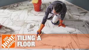 Make sure to clean up any excess thinset on tiles and in between tiles as you go. How To Lay Tile The Home Depot