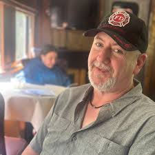 Is there a way to get from gate b/tangerine fields than walking all the way  through? I've badly hurt my ankle and don't know how I'm gonna do that walk  with my