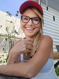 What surf town north of Lisbon has thermal hot springs and a fast train  connection?